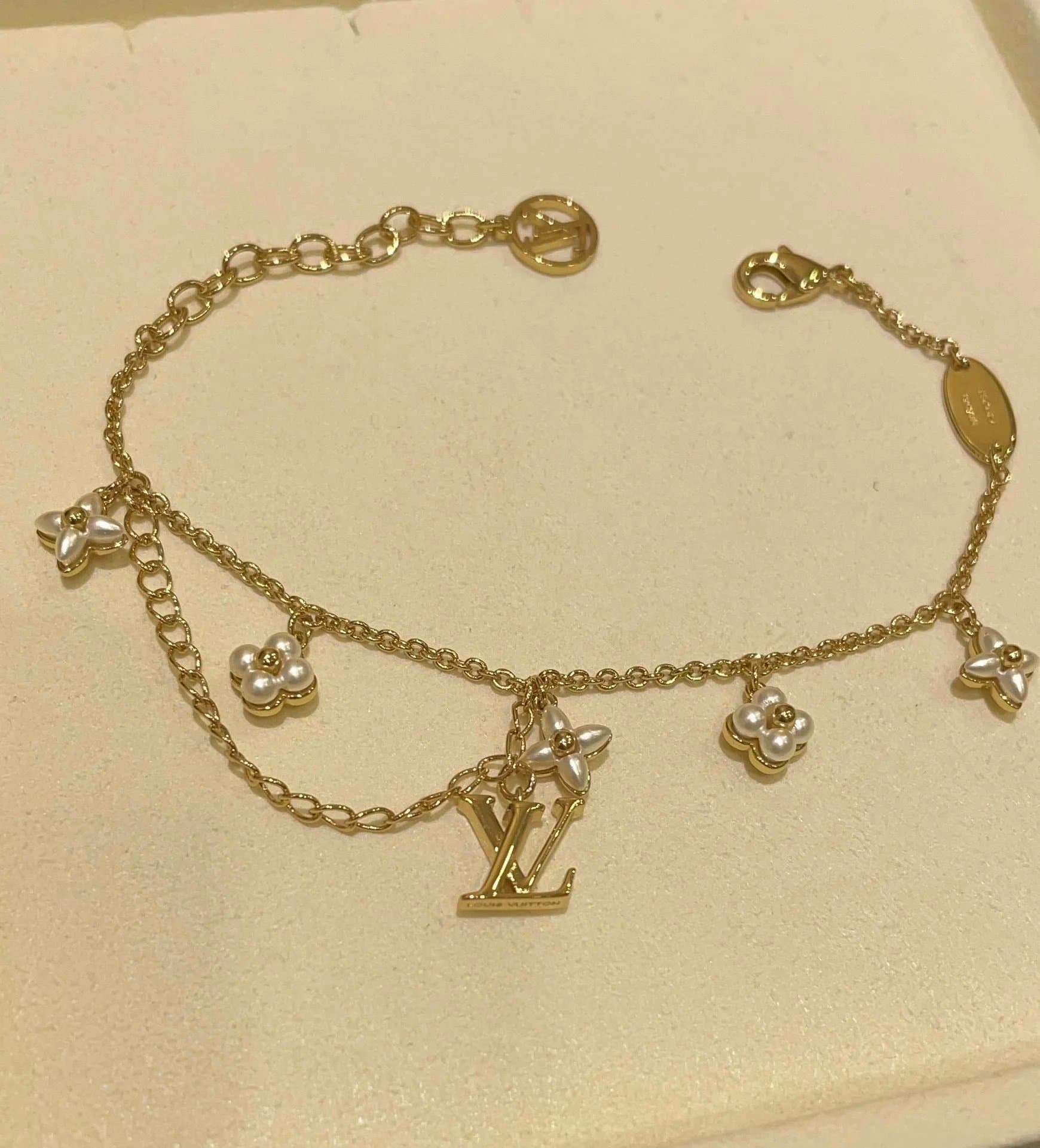 Louis Vuitton Gold Tone Flower Charm Bracelet with LV Logo